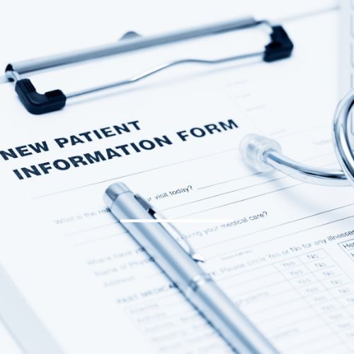 New patient information form on a clipboard